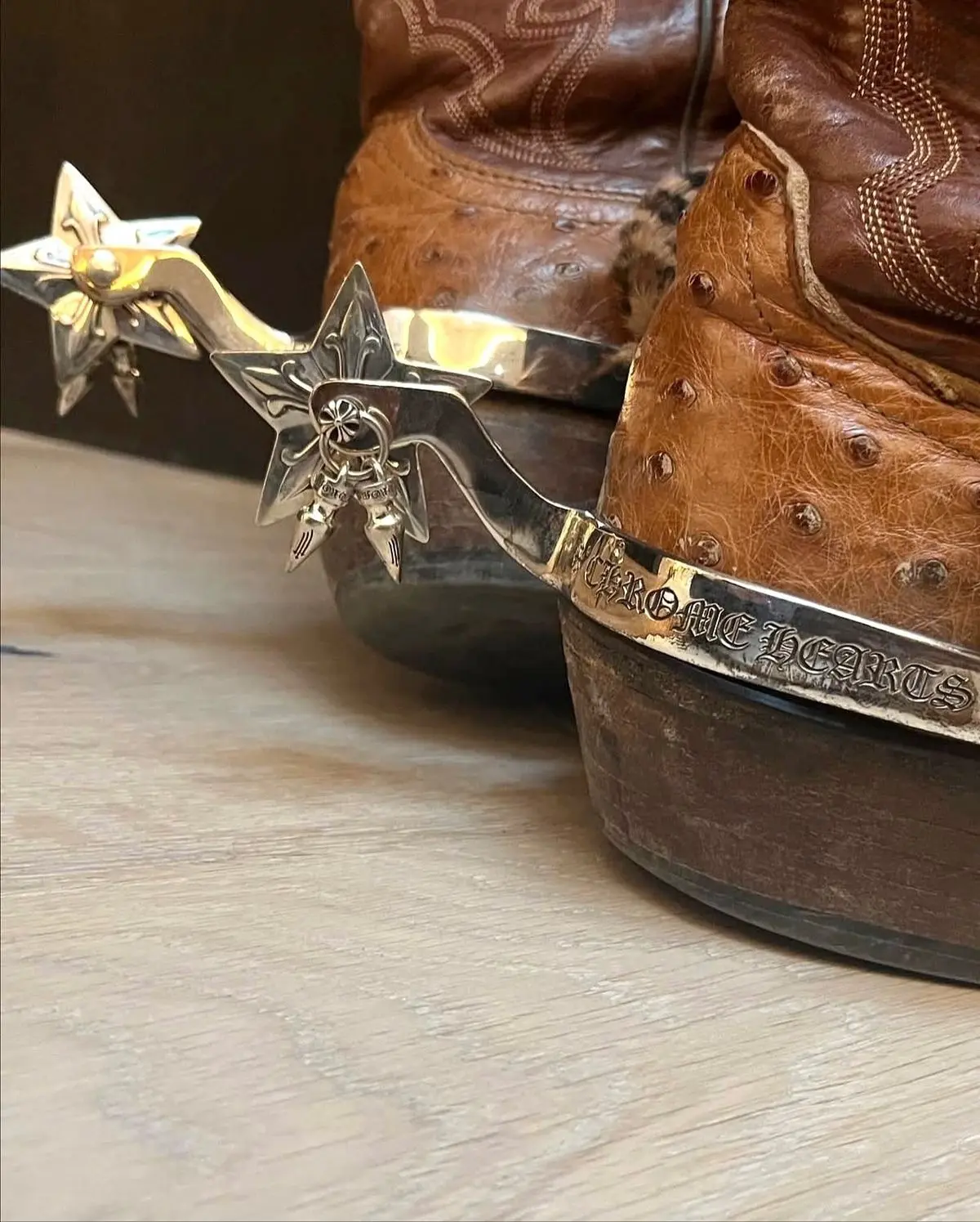 Close-up of a leather cowboy boot with a spur